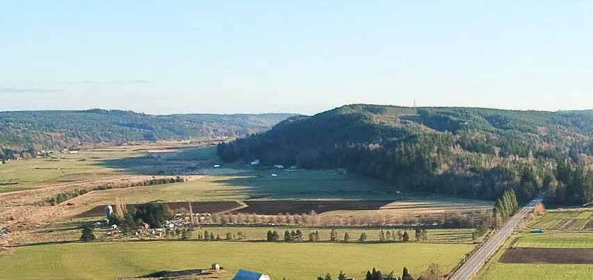 Aerial view of The Glendale Farm's fields in the Chimacum Valley, Jefferson County, Washington